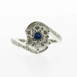 blue-sapphire-crossover-engagement-rings-with-diamonds